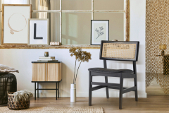 Unique living room interior with stylish rattan armchair,  design furniture, dried flowers, mock up poster frames,  wooden floor, decoration and elegant personal accessories. Modern home. Template.